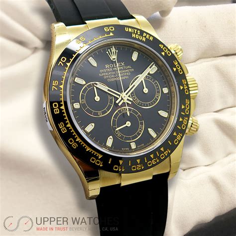 rolex daytona 18k yellow gold.